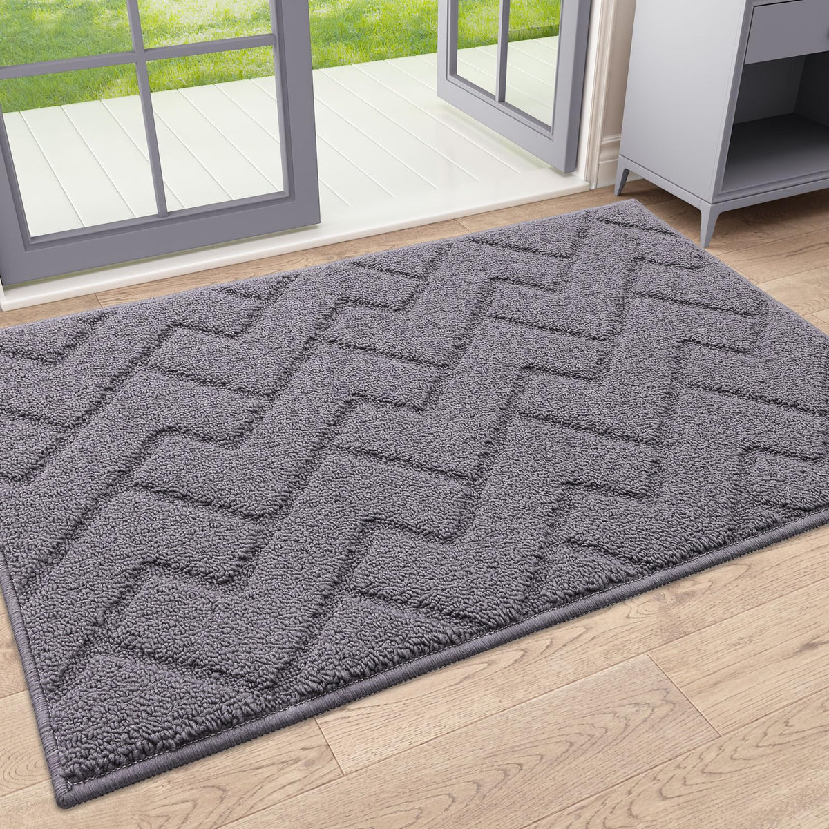 OLANLY indoor door mat showing water absorption to keep entry floors dry