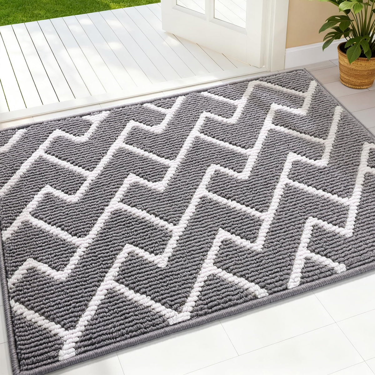 OLANLY front door mat with geometric pattern adds style and quick dirt removal.