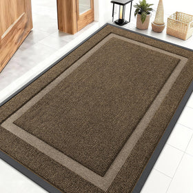 OLANLY door mat with rubber backing for durability and debris control under doors.