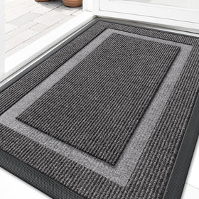 OLANLY front door mat under the door with slim clearance for easy passage.