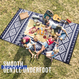 OLANLY lightweight, foldable rug travels well for camping or RV trips.