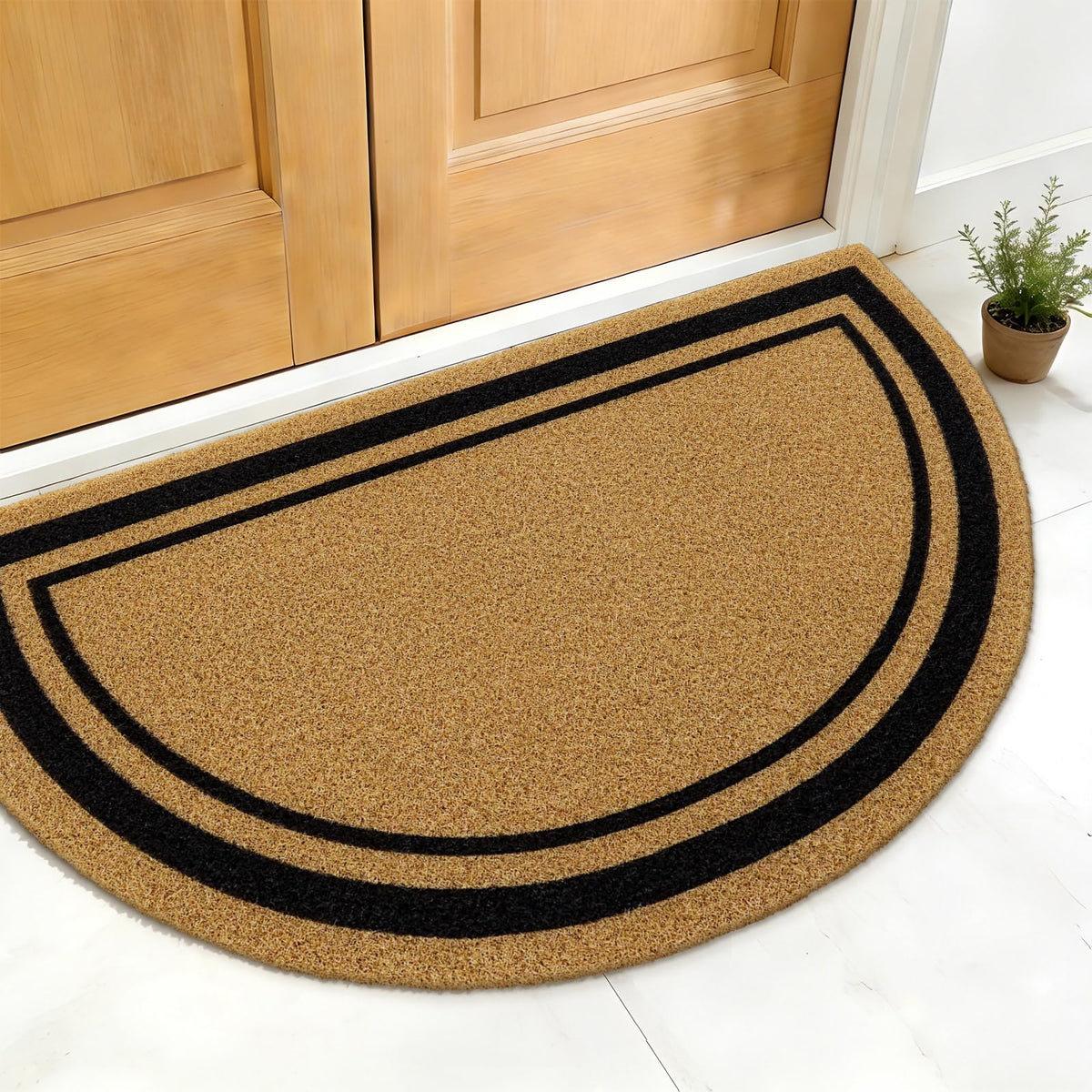 OLANLY low-profile welcome mat sits neatly under doors while trapping grit.