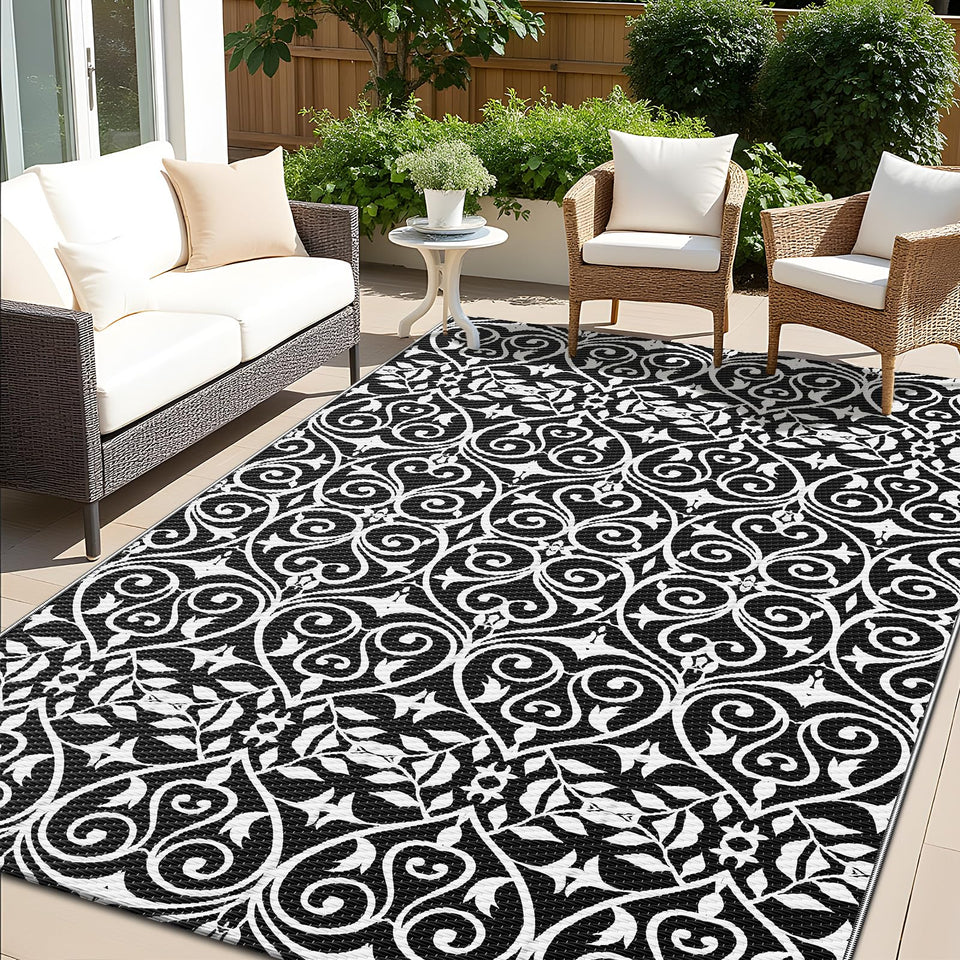 OLANLY outdoor rug with floral pattern; quick-clean surface ideal for patios and decks.