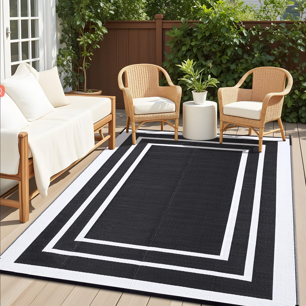 OLANLY outdoor rug 6x9 in black and white on patio for stylish outdoor living