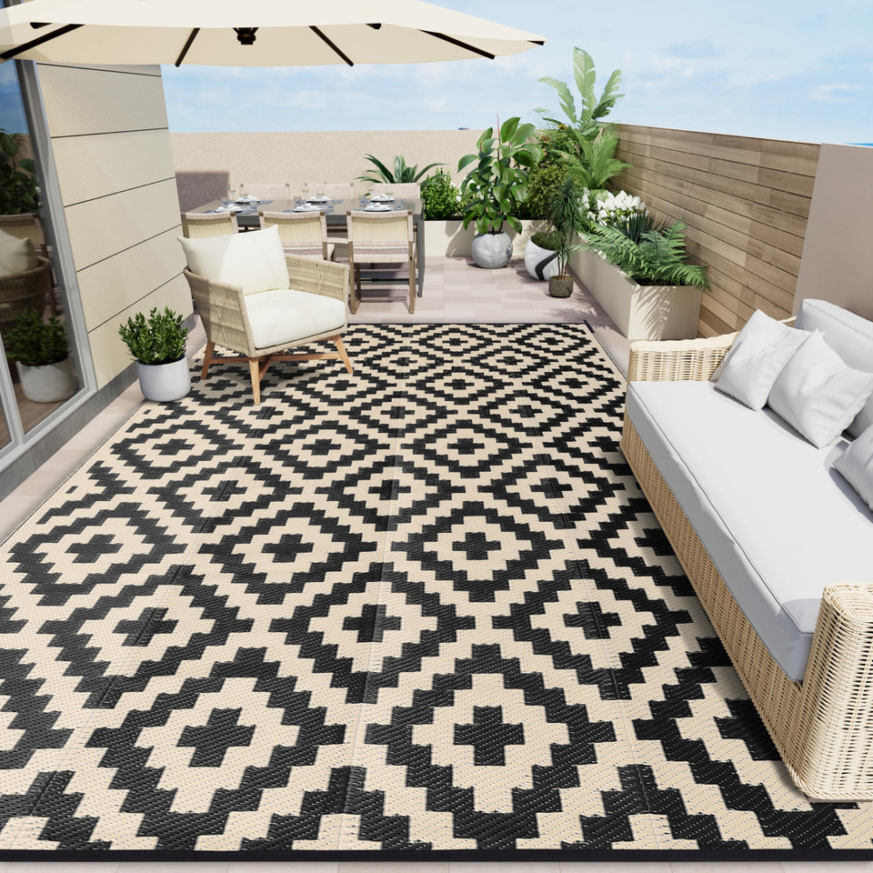 OLANLY waterproof outdoor rug 8x10 in black and beige on a sunny patio