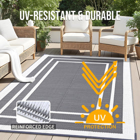 OLANLY 9x12 ft lightweight rug folded for easy portability