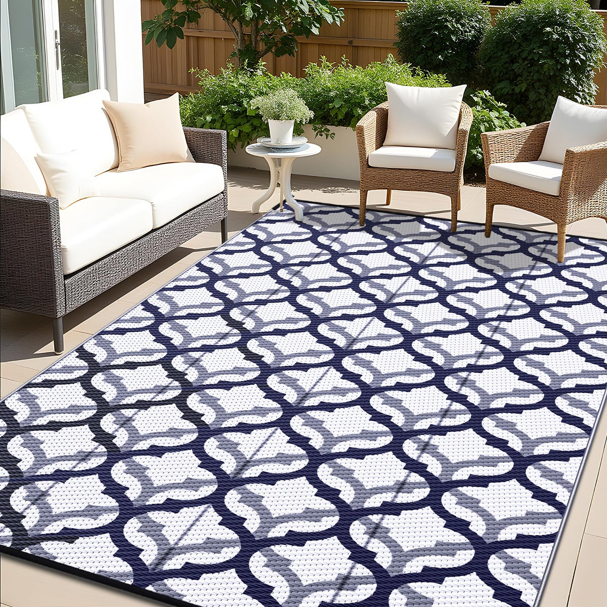 OLANLY reversible outdoor rug in navy and white interlacing pattern for versatile decor