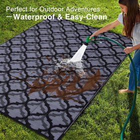 OLANLY plastic straw rug emphasizes stain resistance and easy cleaning after outdoor meals.