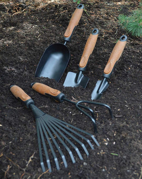 OLMSTED FORGE hand trowel for precise planting and transplanting tasks.