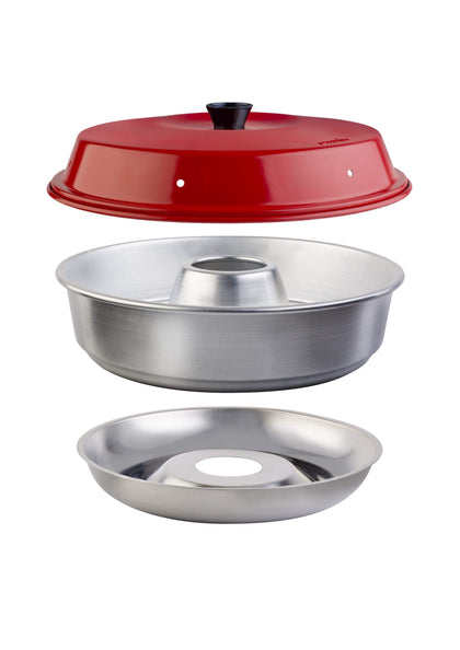 Omnia Oven on stovetop for portable baking setup for camping adventures.