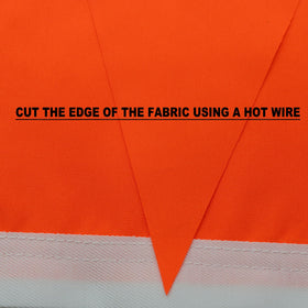 Omnisexual bright orange safety flag visible on a windy boat scene
