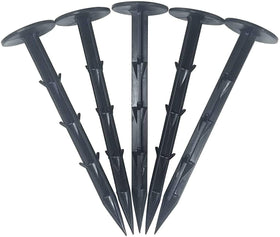 One Stop Outdoor 4in heavy-duty stake securing weed fabric for durable outdoor projects.