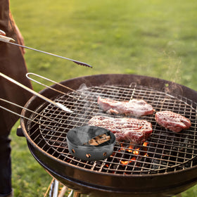 Onlyfire Chef smoker box designed for portable grills on outdoor adventures.