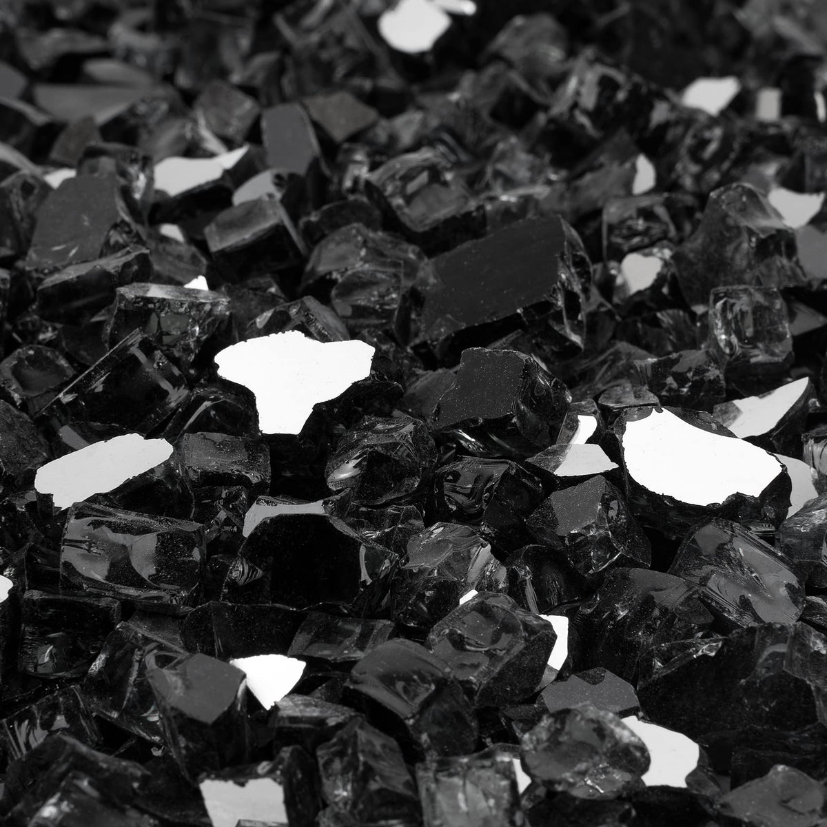 Onlyfire fire glass rocks gleaming surface for daytime sparkle and nighttime flame enhancement.