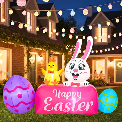Opemon Easter inflatable bunny with LED lights illuminates evening yard decor.