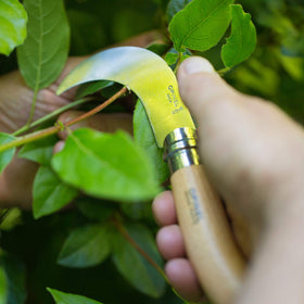 Opinel No. 10 pruning knife yatagan blade offers versatile cutting for vines.