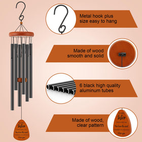 Oprever wind chime hanging from a tree highlights outdoor decor.