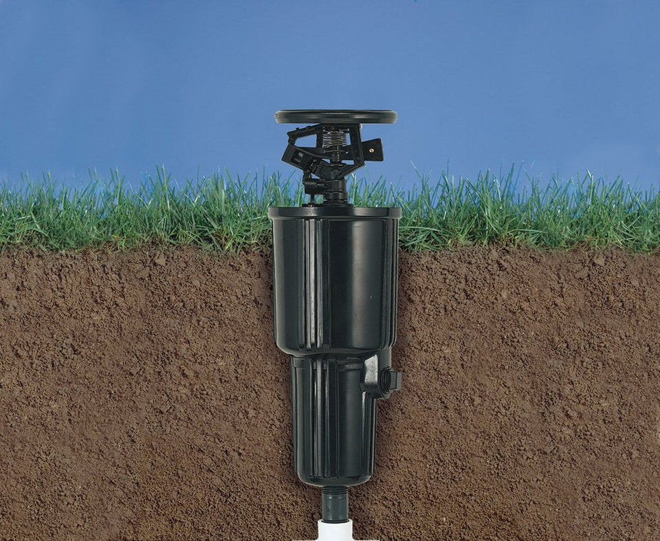 Orbit 55200 pulse pop-up sprinkler head in action delivering even coverage