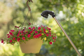 Orbit 56580Z 36-inch wand extends reach to beds and pots.