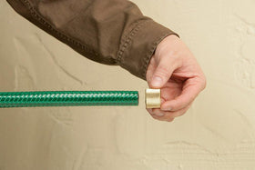 Orbit 56801N brass male connector for secure outdoor watering connections.