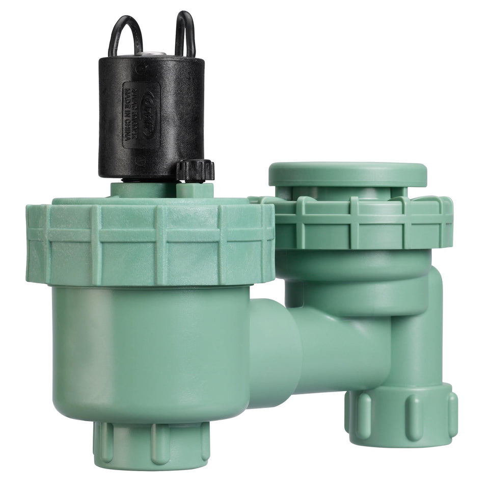 Orbit 57626 jar-top anti-siphon valve installed outdoors protects irrigation.