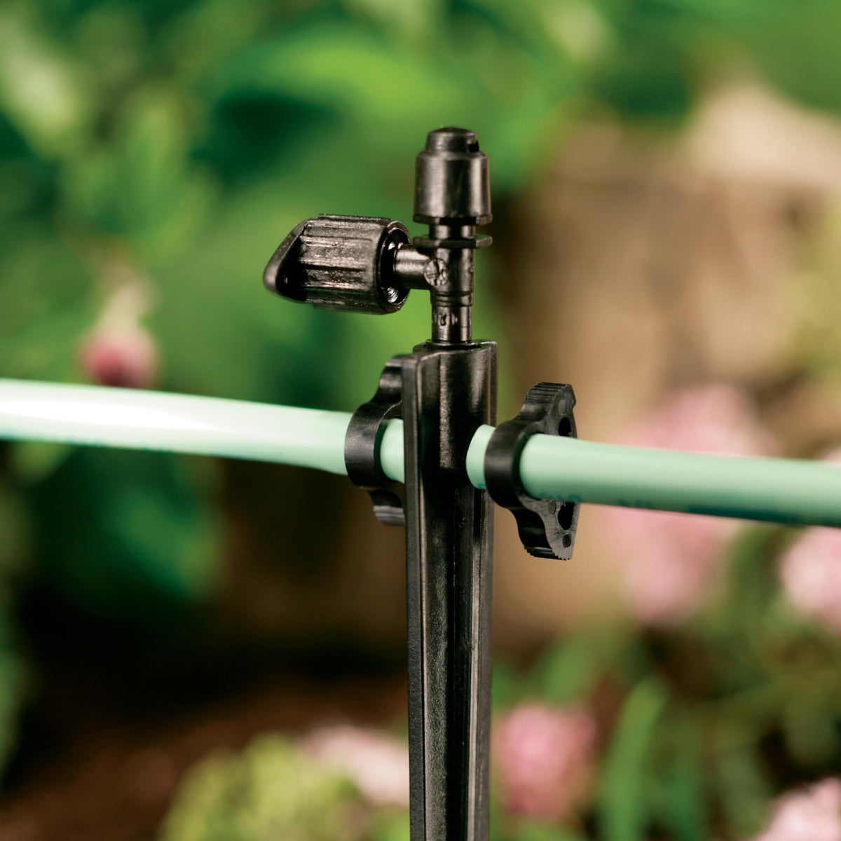 Orbit 67710 close-up of tubing connection grip for leak-free outdoor irrigation