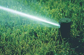 Orbit large-yard sprinkler system in-ground setup demonstrates six heads for wide-area coverage.