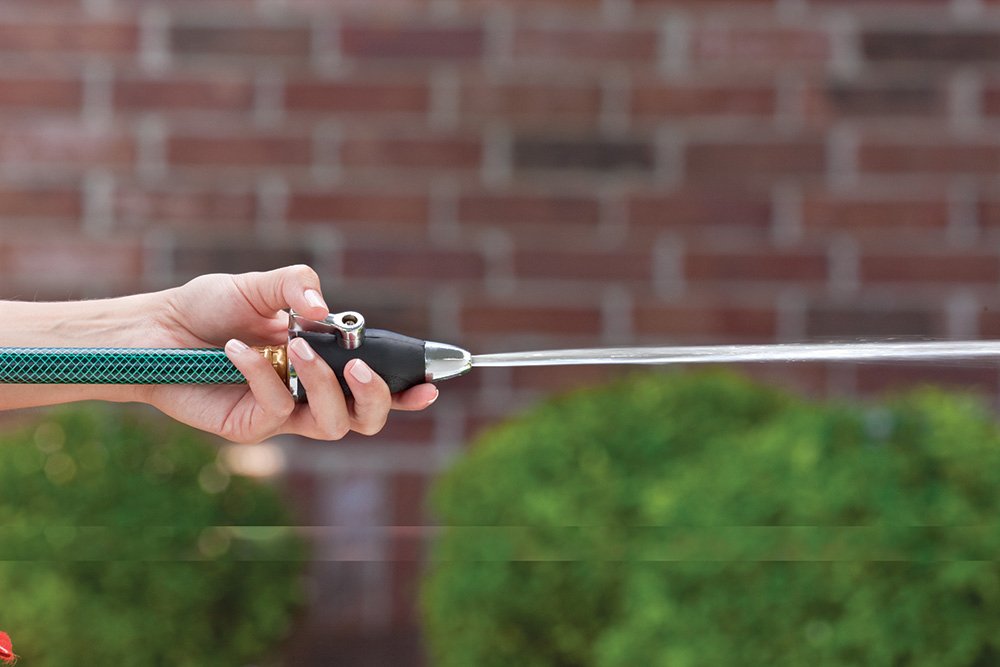 Orbit SunMate shut-off lever demonstrates fingertip flow control on a hose-end nozzle
