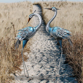 Oritty decorative cranes create focal points in gardens and yards.