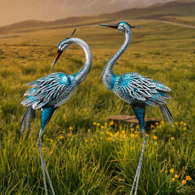 Oritty large metal cranes add wildlife charm to outdoor spaces.