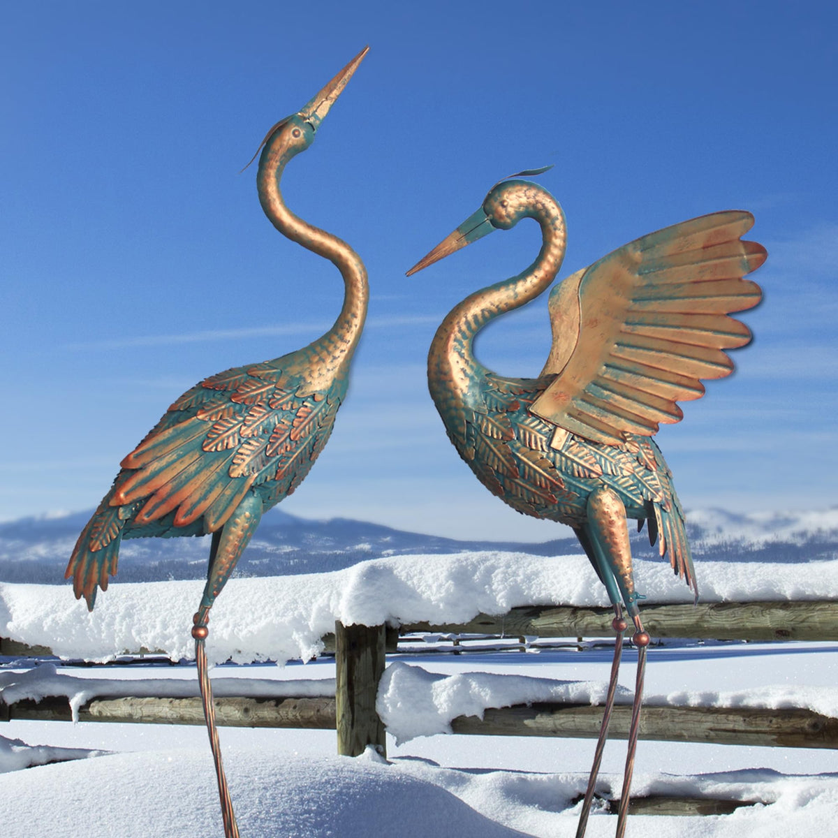 Oritty crane wing spread statue creates a natural garden focal point.