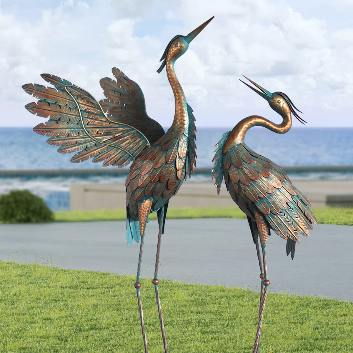 Oritty crane statues copper 42-inch yard art creates a bright focal point for landscapes.