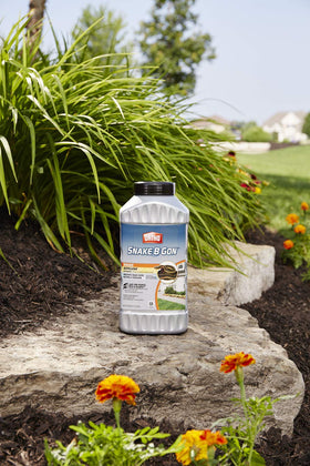 Product being spread near a shed to create a barrier