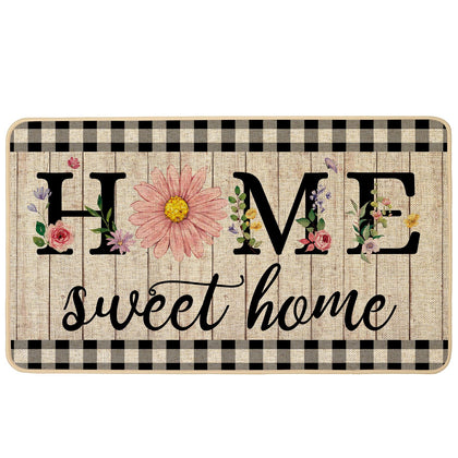 ORTIGIA Home Sweet Home doormat with pink daisy design and non-slip backing.