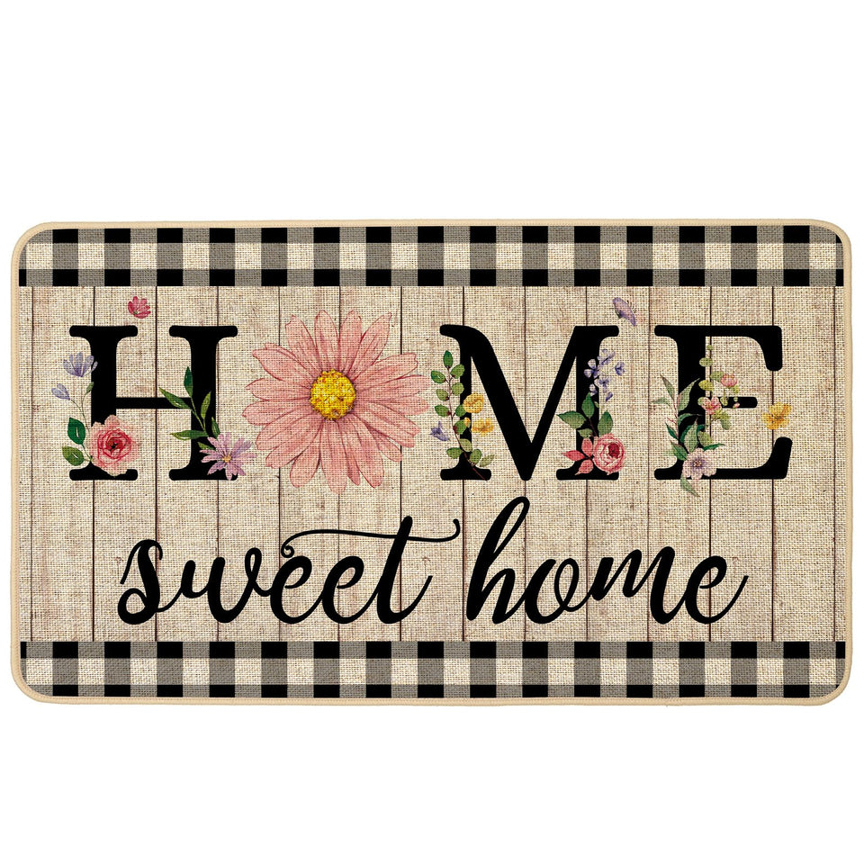 ORTIGIA Home Sweet Home doormat with pink daisy design and non-slip backing.