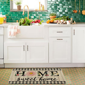 ORTIGIA rubber-back mat offers non-slip grip on entryways.
