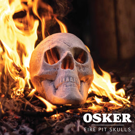 OSKER skull as Halloween decor with fire for spooky ambiance.