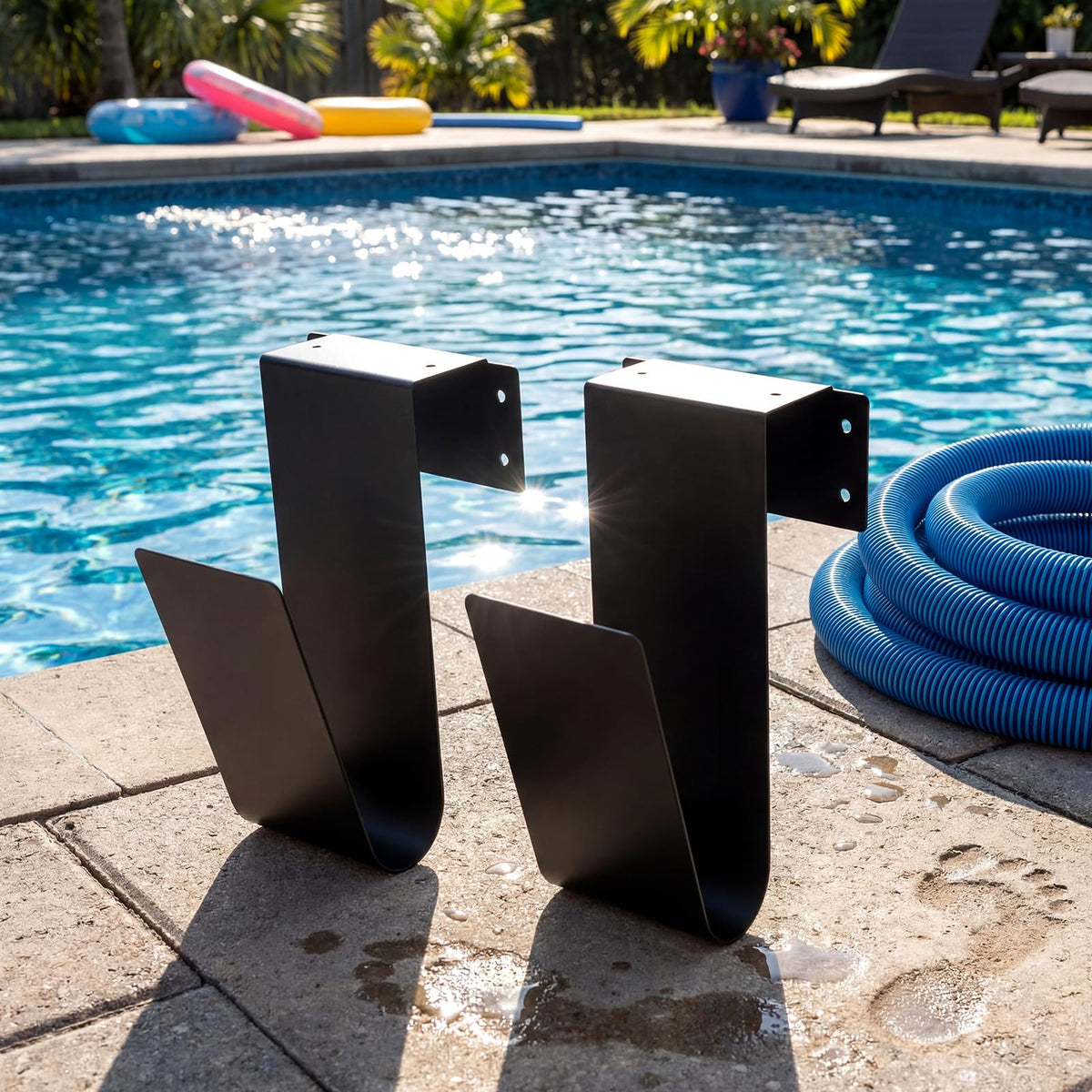 Otoolling wall-mounted hose hanger secures pool equipment off the ground.