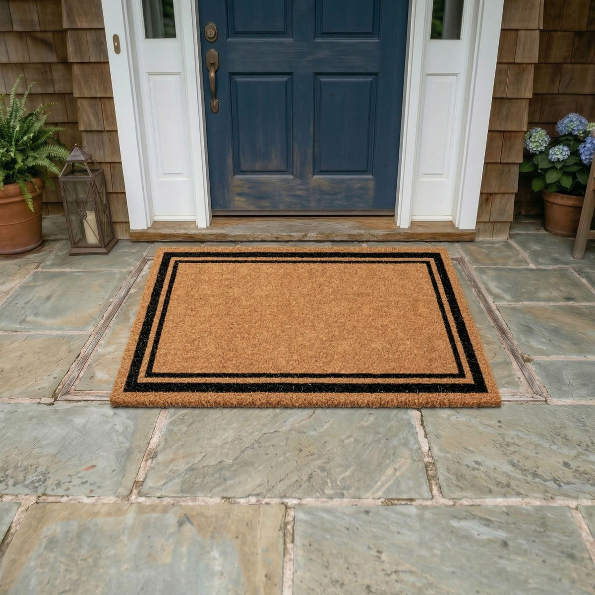 Ottomanson Coco Coir border-design adds subtle frame to entryway.