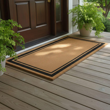 Ottomanson Coco Coir Front-Door Mat demonstrates rugged scraping action for clean entryways.