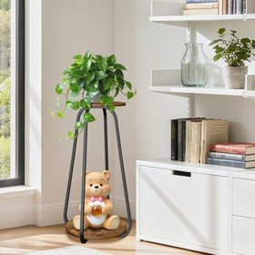 OugeWood living room display stand showing decorative items and plants together.