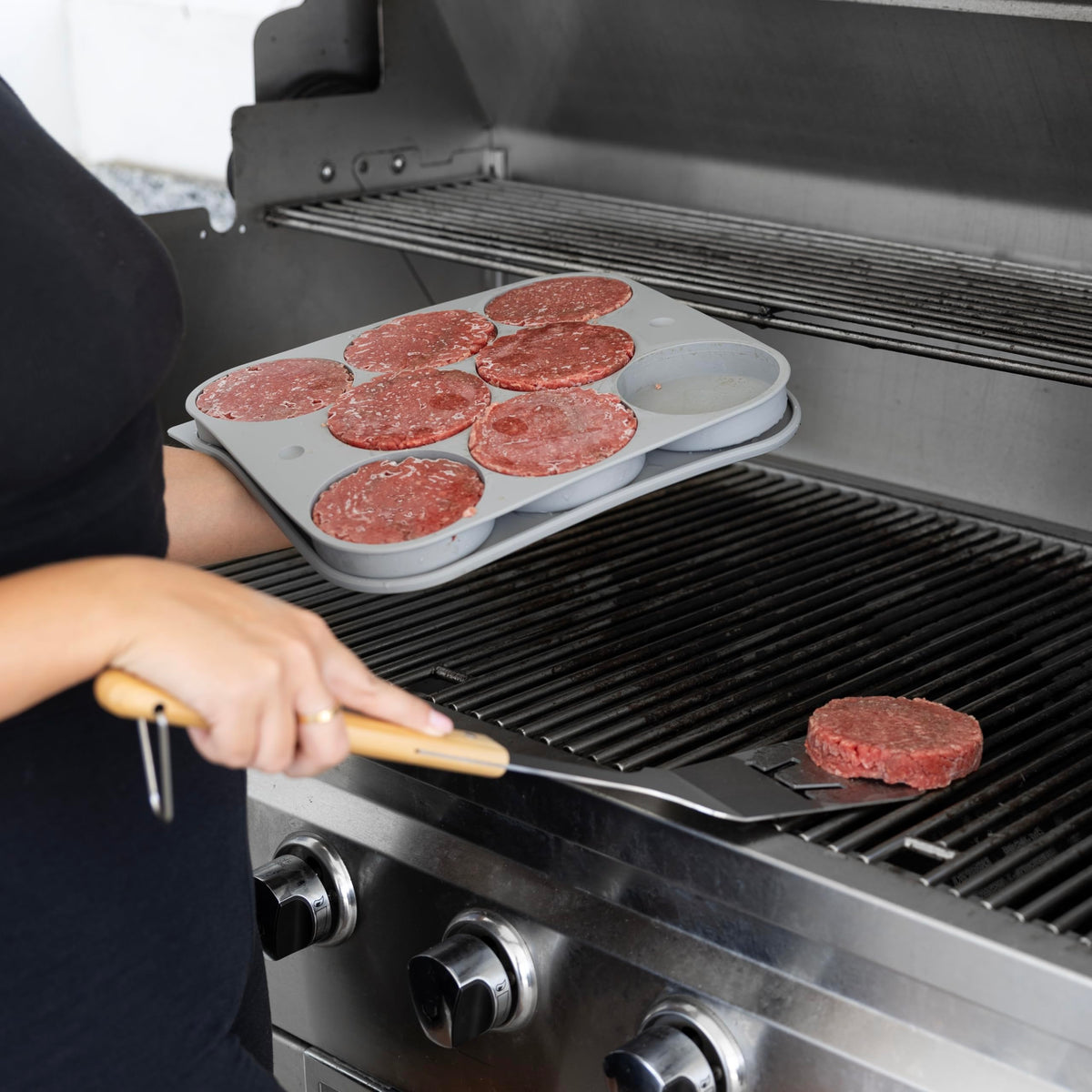 Outset tray setup demonstrates complete burger prep, press, and storage.