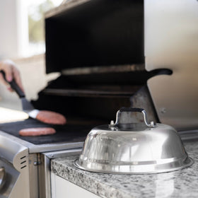 Outset griddle-dome used on grill, griddle, or stovetop for faster melting.
