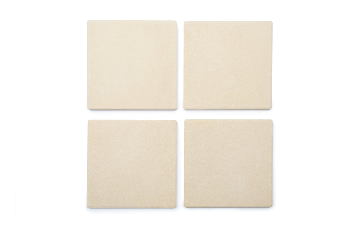 Outset pizza stone tiles on grill for crisp, browned edges