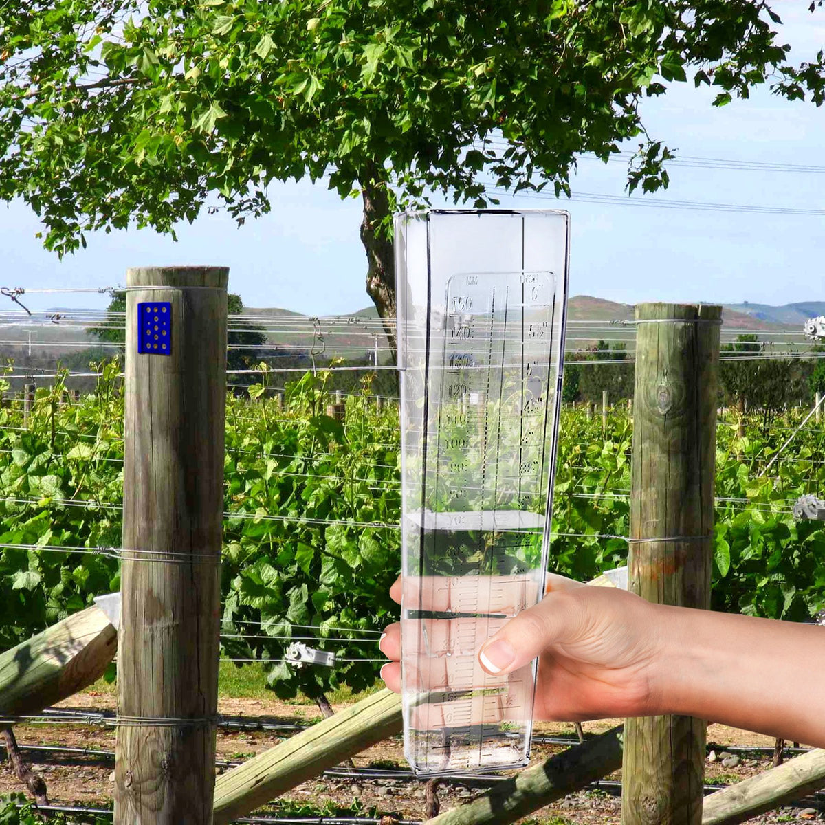 OUTWEST TRADING rain gauge packaging and quick-mount hardware included.