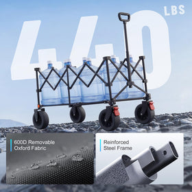 Overmont all-terrain wheels stabilize movement across sand, grass, and gravel.