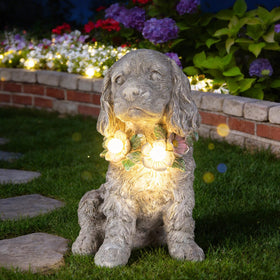 Ovewios solar LED dog statue lights automatically in darkness for ambience.