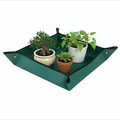 Owl Focus repotting mat on a worktable with durable Oxford fabric for mess-free gardening.