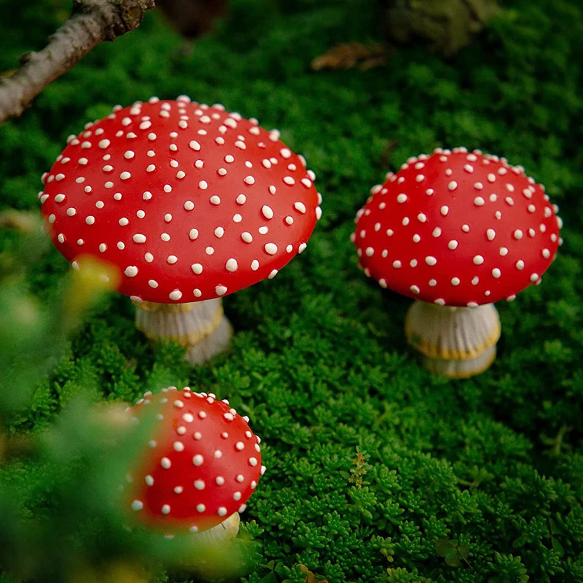OwMell glow in the dark mushroom used as patio decor after sunset.