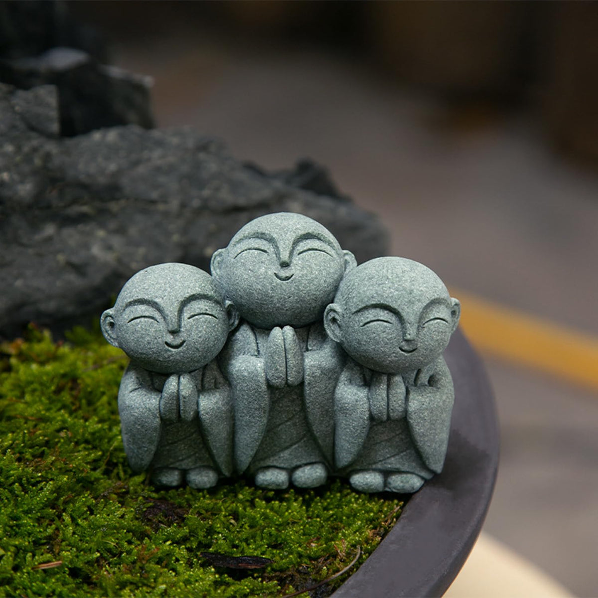 OwMell Jizo Monk statue on window sill adds serenity.